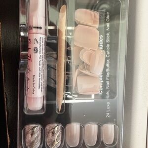 Light pink black and gold glue on nails